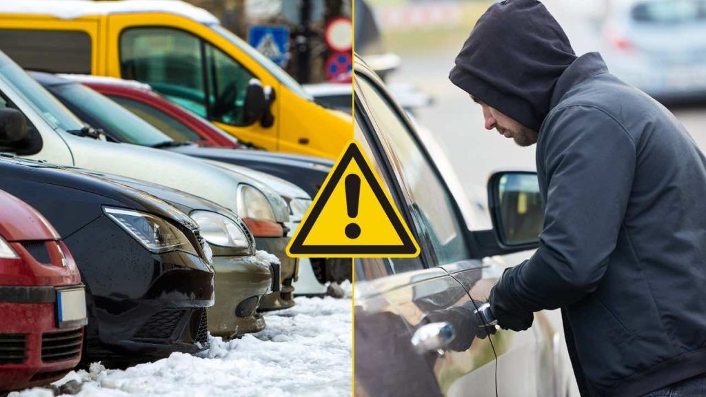 Auto parcheggiate e ladro in atto